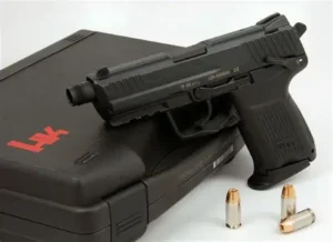 HK45 DA/SA pistol demonstrating double strike capabilities – Heckler & Koch HK45 on case with .45 ACP rounds