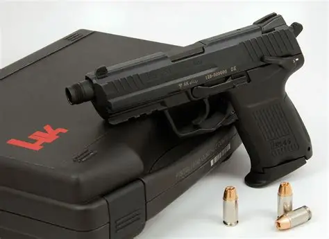 HK45 DA/SA pistol demonstrating double strike capabilities – Heckler & Koch HK45 on case with .45 ACP rounds