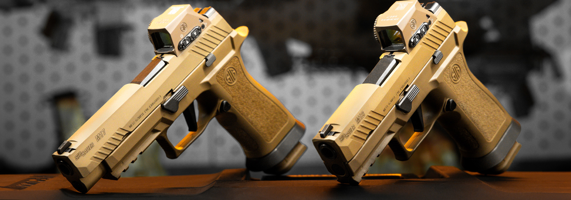 SIG Sauer M17 and M18 pistols in coyote-tan finish with optics installed, displayed side-by-side for comparison